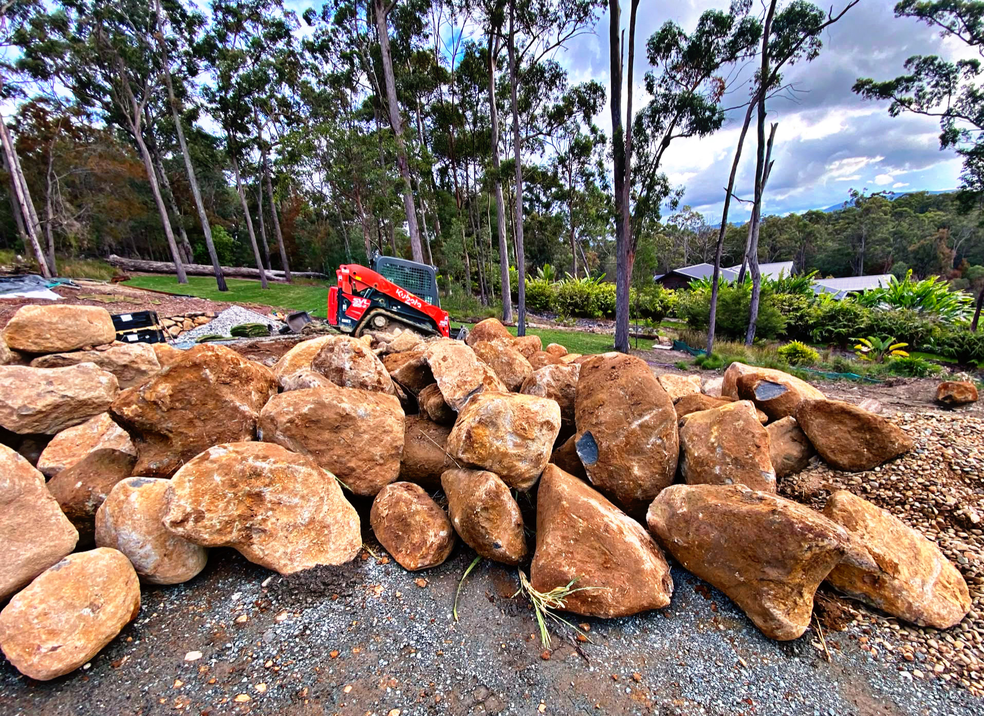 Basalt bushrock stockpiled on site, ready for delivery